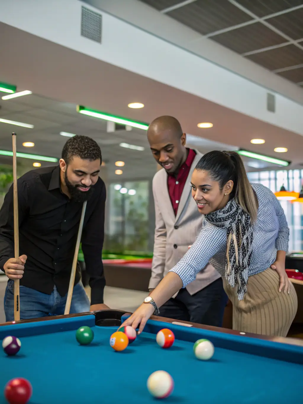 A promotional image for a youth billiard program, featuring young players learning the basics of the game in a fun and supportive environment.